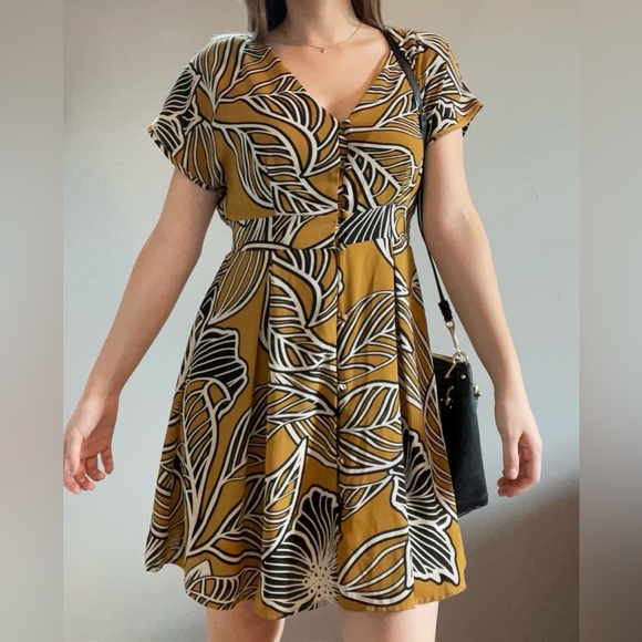 Sienna Sky Dresses & Skirts - Sienna Sky yellow banana leaf button up v-neck dress.